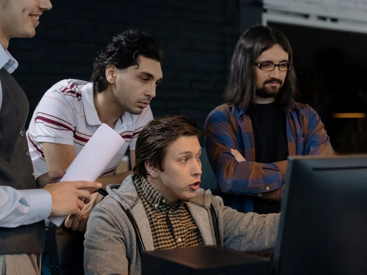 A team of developers working together in a modern office