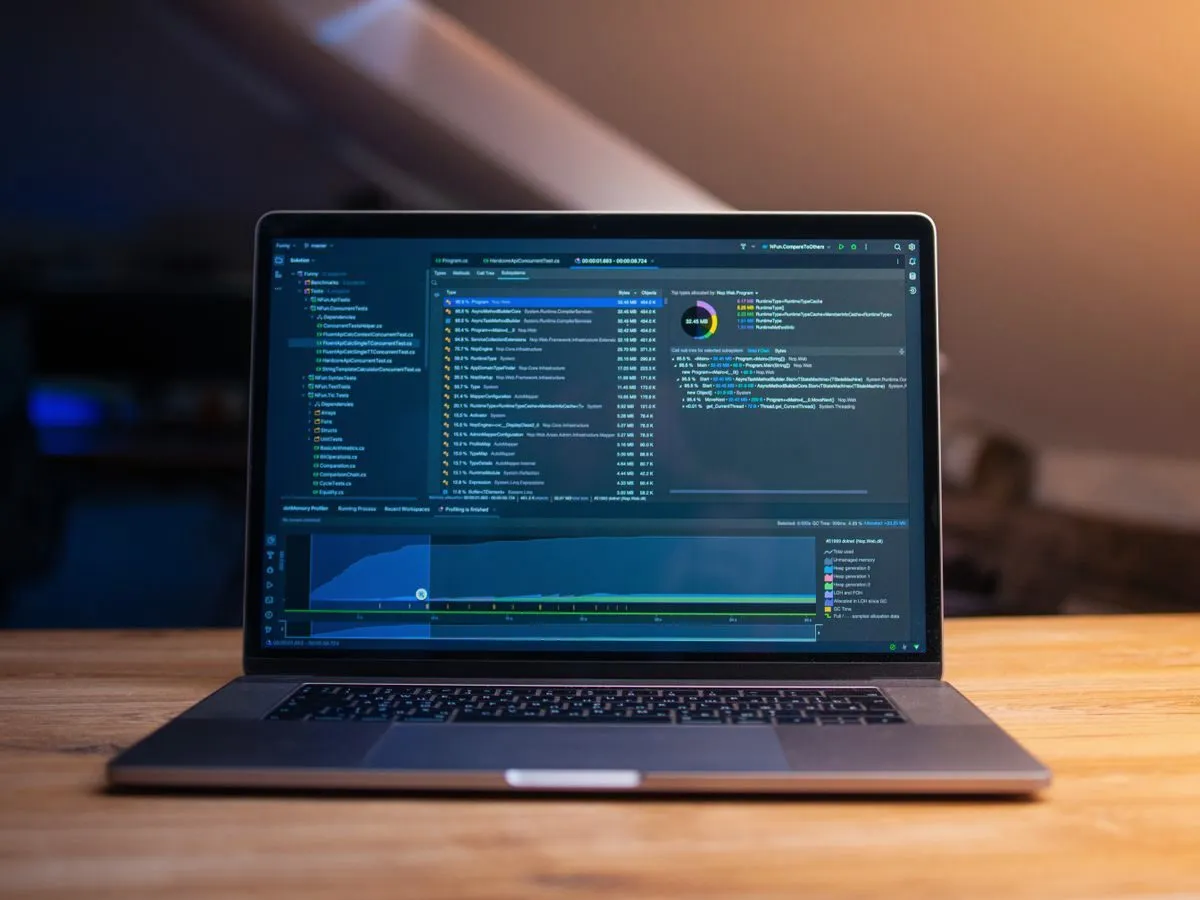 Laptop showing code on a desk