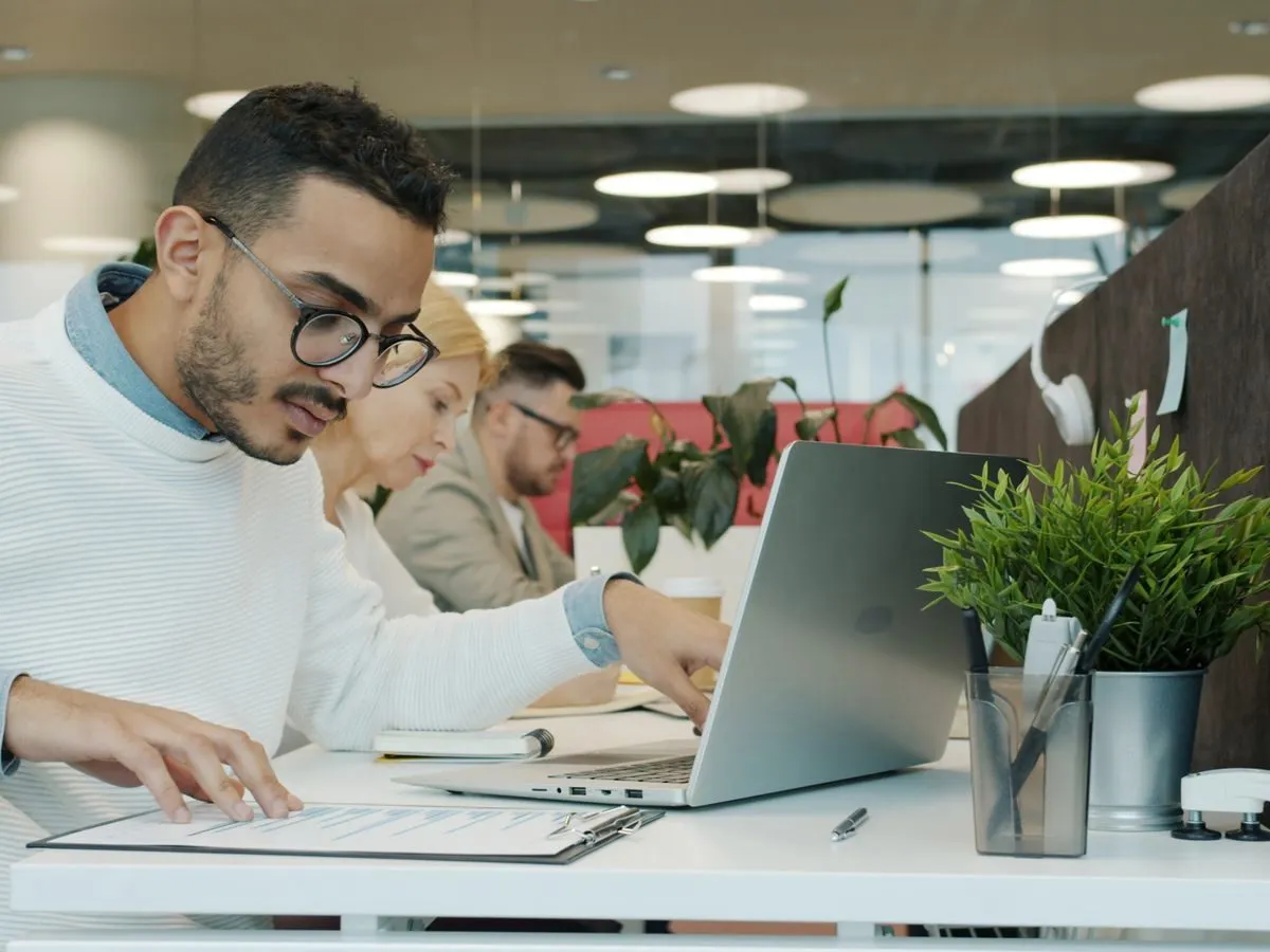 Professionals working in an open office