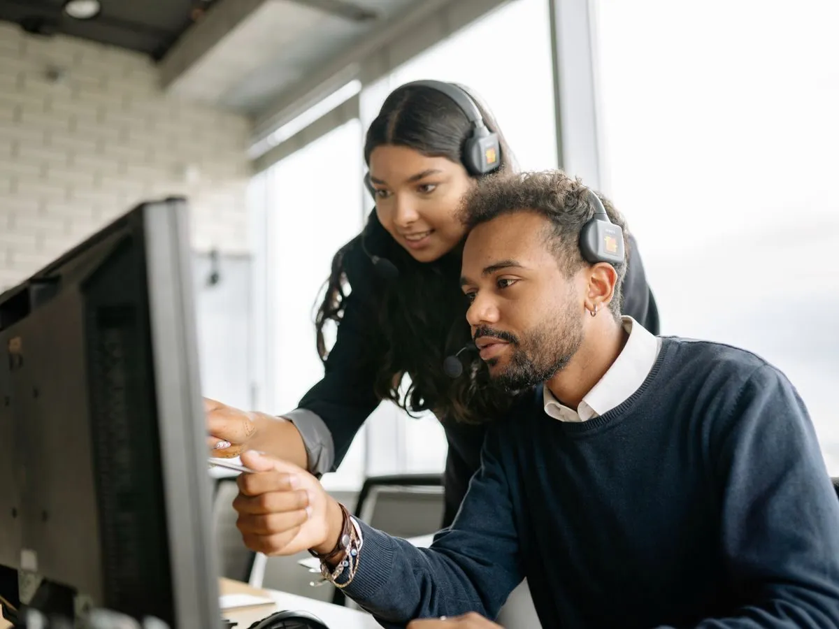 Support team working together with headsets